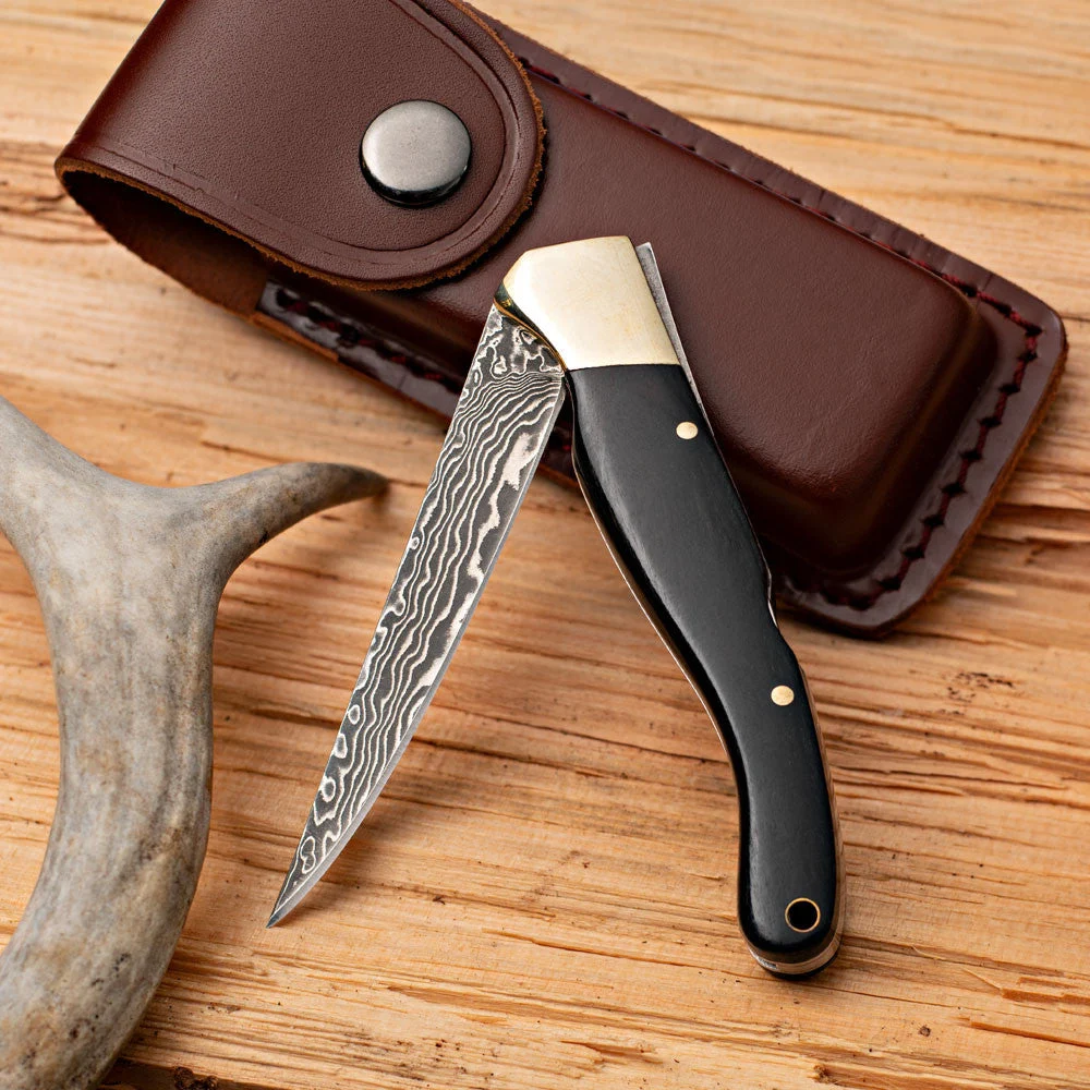 damascus-steel-ebony-handled-folding-knife.webp Damascus Steel & Ebony Handled Folding Knife